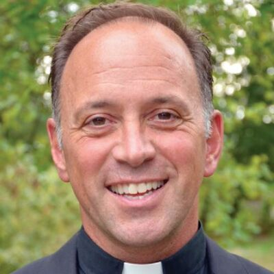 Rev. John J. Unni
